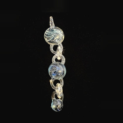 Wil Glass and Mina Glass particle collider pendant, three attachments linked on a clear glass chain, full length