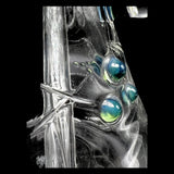Detail of raised silver slyme dots and hand carving on the shoulder of the beaker