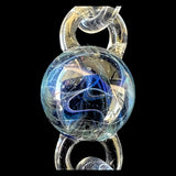 The middle particle collider attachment, blue under clear glass, set between two chain links