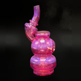 Royal Jelly Puffco Peak top, three-quarter view on a dark ground