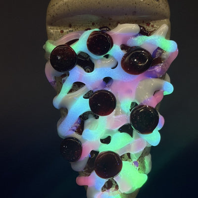 Biohazard Glass pizza Pivot top under blacklight, the UV reactive glass glowing, on its 3D printed stand