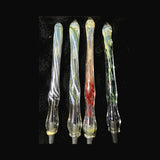 Four hand blown glass pens by Chris Barclay laid in a row, inside-out color lines and frit under silver fuming, Bic refill tips visible