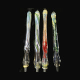 Four hand blown glass pens by Chris Barclay laid in a row, inside-out color lines and frit under silver fuming, Bic refill tips visible