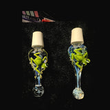 Close view of the sculpted green frogs and frit on Chris Barclay hand blown glass wine stoppers