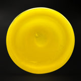 Underside of the canary yellow glass jar, marked on the base