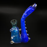 The other side of the blue dry pipe, the bear in front and the dotted stem behind