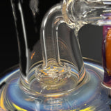 Close up of the 6 hole diffusion at the base of the clear body, over the thick foot