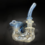 The same Sherlock held in hand from the other side, the bowl piece to the left and the mouthpiece up
