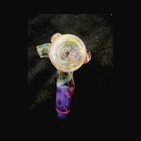 Top view of the hammer pipe bowl, fumed rim in pale gold with marbles either side