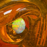 Close-up of the opal set in the shark's eye