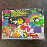 Back of the NeeDoh Advent Calendar box by Schylling, showing some of the squishy surprises inside