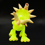 The triceratops rig face on, the horns, the millie eye and the mouthpiece above the frill