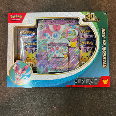 Pokémon TCG 30th Celebration Sylveon ex Box, front, factory sealed, on the High Tide shop floor in Santa Barbara