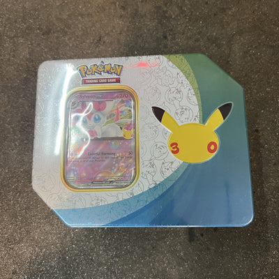 Pokémon TCG 30th Celebration Tin, Sylveon ex, front, factory sealed, on the High Tide shop floor in Santa Barbara