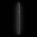 Puffco Hot Knife in Onyx, black heated loading tool with the cap on, on a dark background