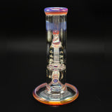 The piece turned slightly, the grid line perc reading through the chamber wall