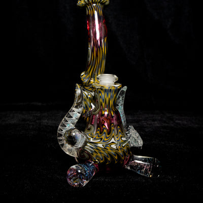 Hampton "Hidden Lines 2.0" tri pod rig in amber and pink linework, with its matching cap alongside.
