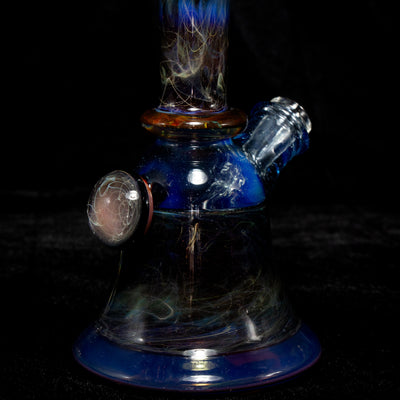 Wil Glass x Arko Particle Collider mini tube, blue base and fumed neck with a pink opal on the front.