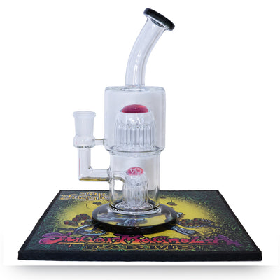 Toro Double Mac x Sugar Magnolia rig with Royal Jelly and black, standing on the mood mat it comes with, on white