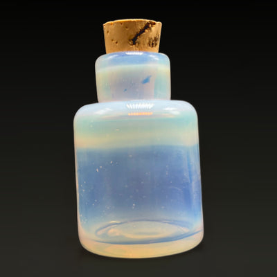 Ghost ISO bottle with a cork top, front view