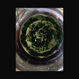 Looking into the extra thick base of the tube, packed with Experimental Green #5 frit