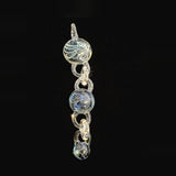 Wil Glass and Mina Glass particle collider pendant, three attachments linked on a clear glass chain, full length
