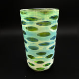 Hand blown glass by Wil Glass, pale green and teal with green oval spots under silver fuming, full view