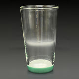 Wil Glass double layer cup, side profile, clear glass with carving and a Tidepool green foot