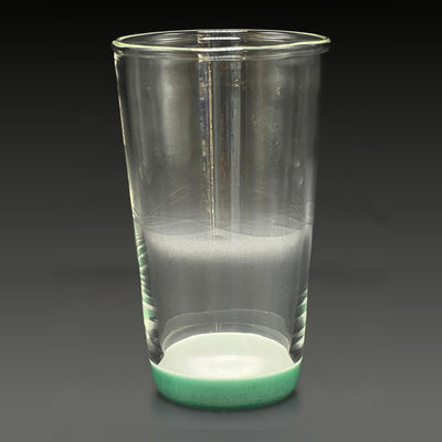 Wil Glass double layer cup, side profile, clear glass with carving and a Tidepool green foot