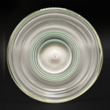 Looking down into the double layer cup II, the green rings of the base through the clear glass