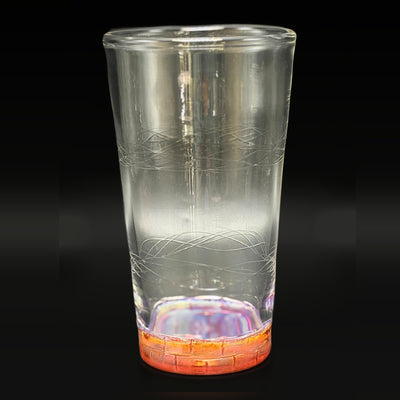 Wil Glass bricked up cup, side profile, clear glass with carving and a brick-pattern Aurora foot