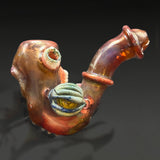 The other side of the Sherlock, the blue-grey eye attachment with its implosion eyeball on the can