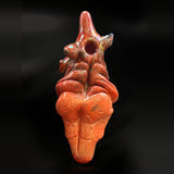 The goddess pipe from behind, with the opening at the back of the head