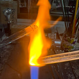Hot glass worked to a shaped tip in the torch flame at the High Tide Santa Barbara studio, where the Intro to sculpting class is taught