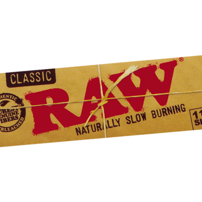 RAW Classic 1 1/4 size rolling papers, unbleached pack shown close up.