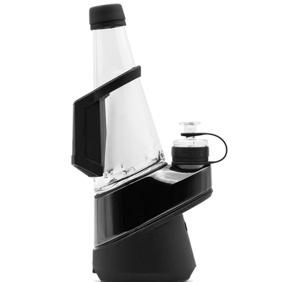 Puffco Peak travel pack fitted to the device, cover over the glass and cap stowed at the side.